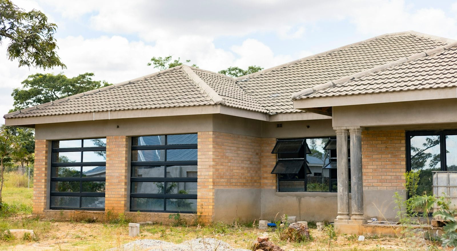 Single-story brick house with a tiled roof